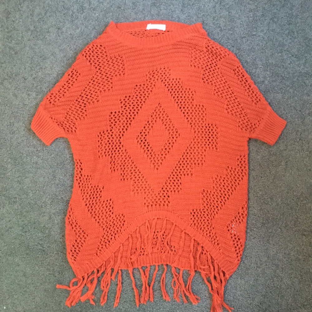 Rust colored knit pullover top